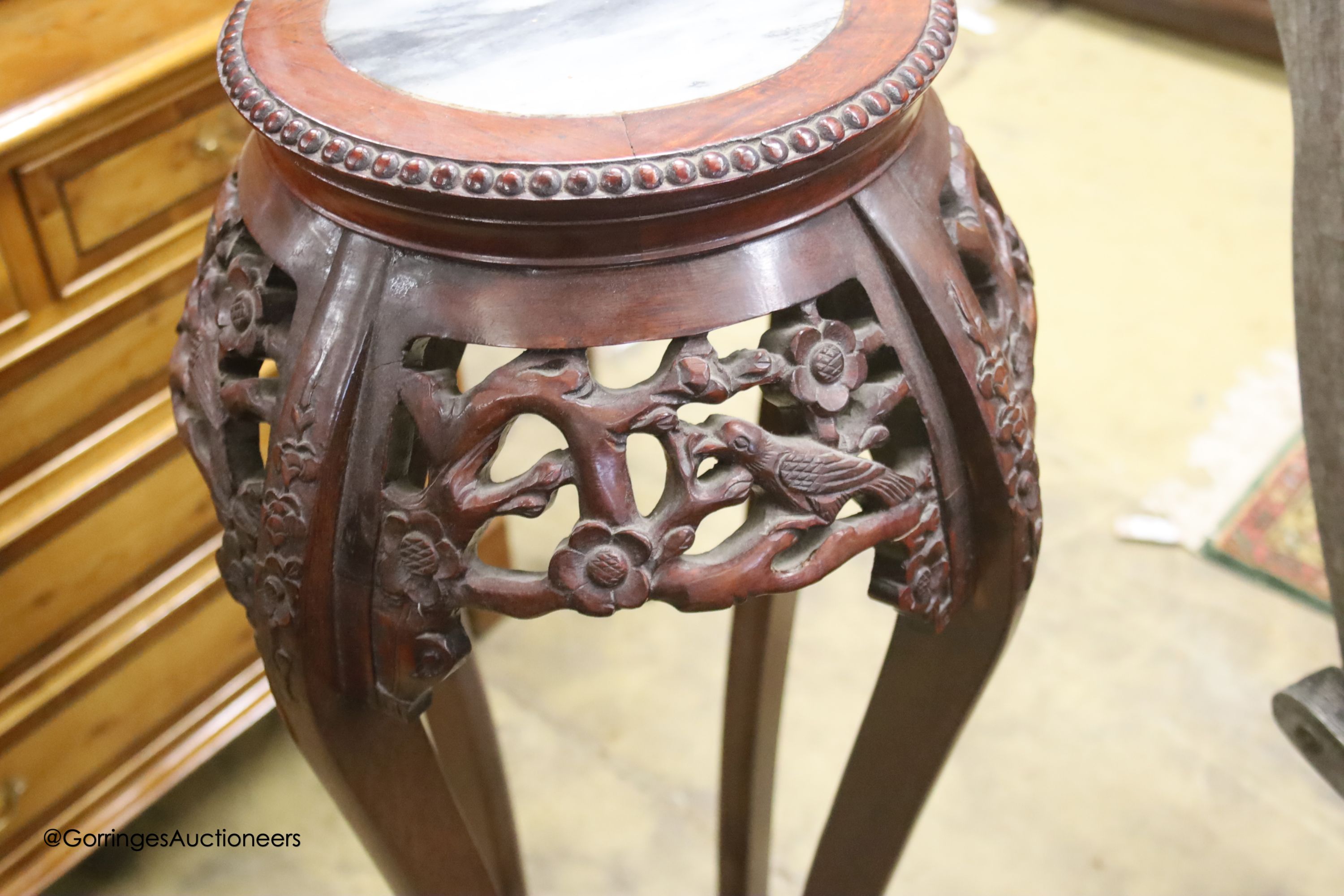 A Chinese marble topped jardiniere stand, height 94cm